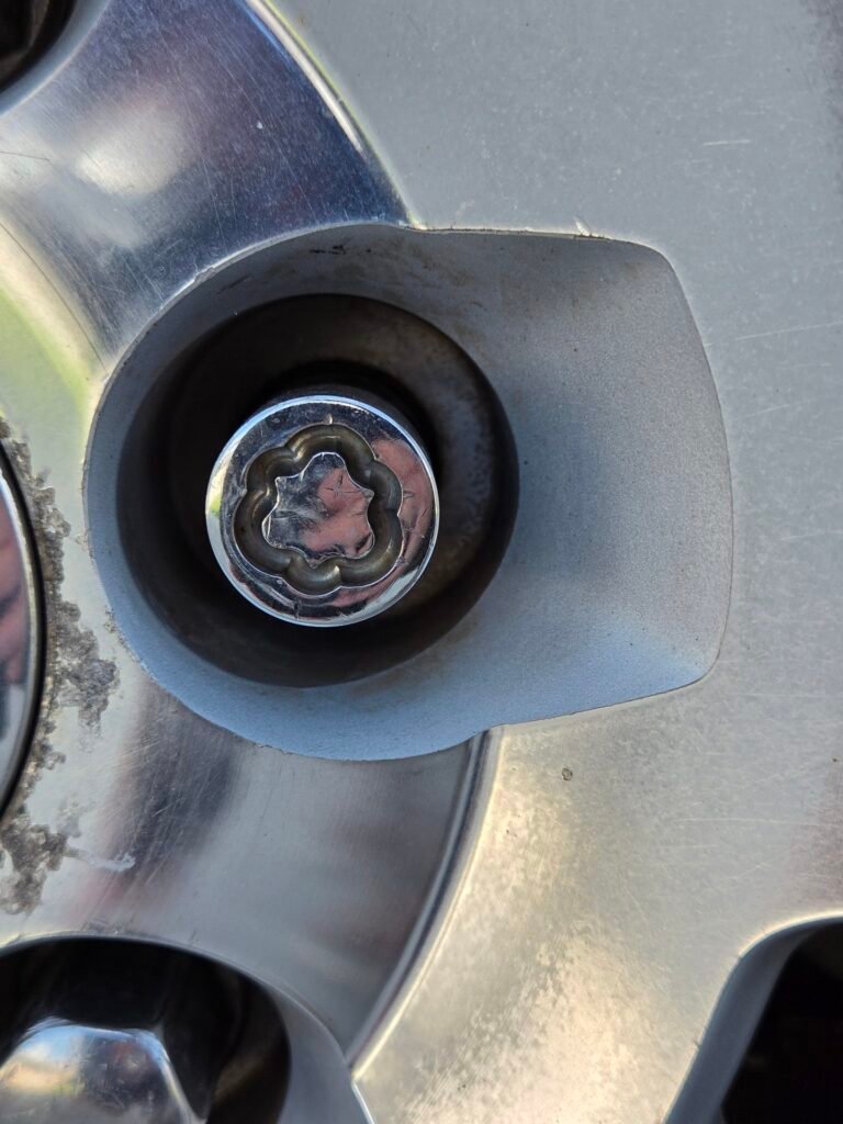 2015 GMC Sierra 1500 4WD Crew Cab SLE wheel locking nut key replacement