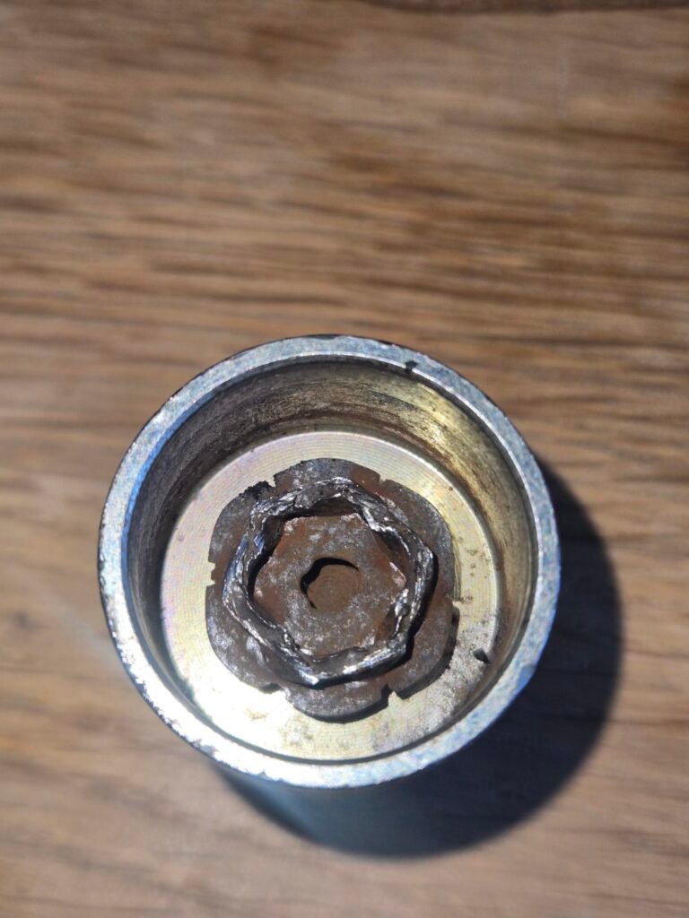 bmw 3 series 320i wheel locking nut key replacement