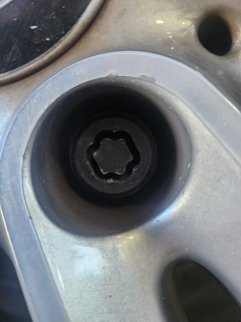 Bmw 328i wheel locking nut key replacement