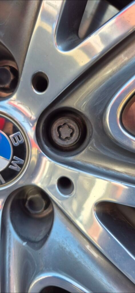 Bmw 740 wheel locking nut key replacement