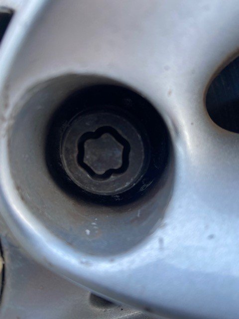 BMW 2 SERIES wheel lock key code