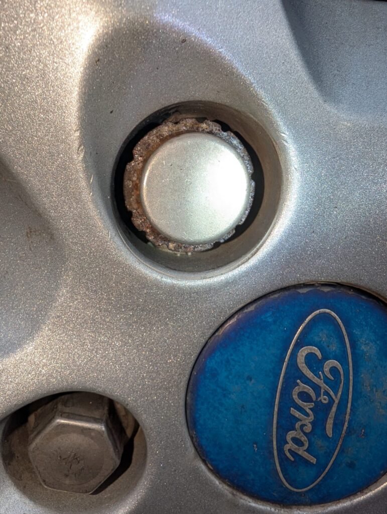 Ford C-max wheel lock key code