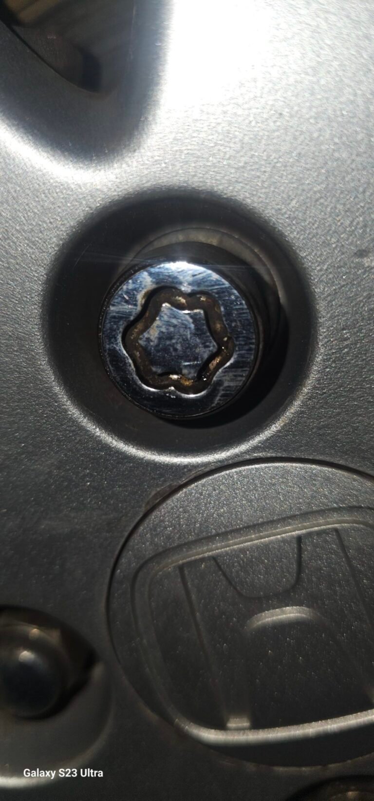 Honda jazz 2006 model wheel locking nut key replacement