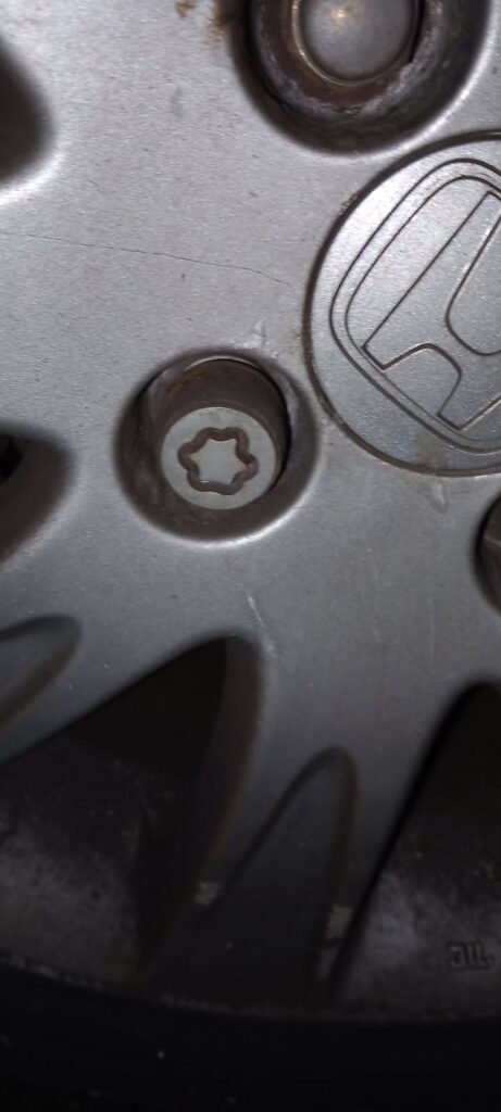 Honda Jazz wheel lock key code