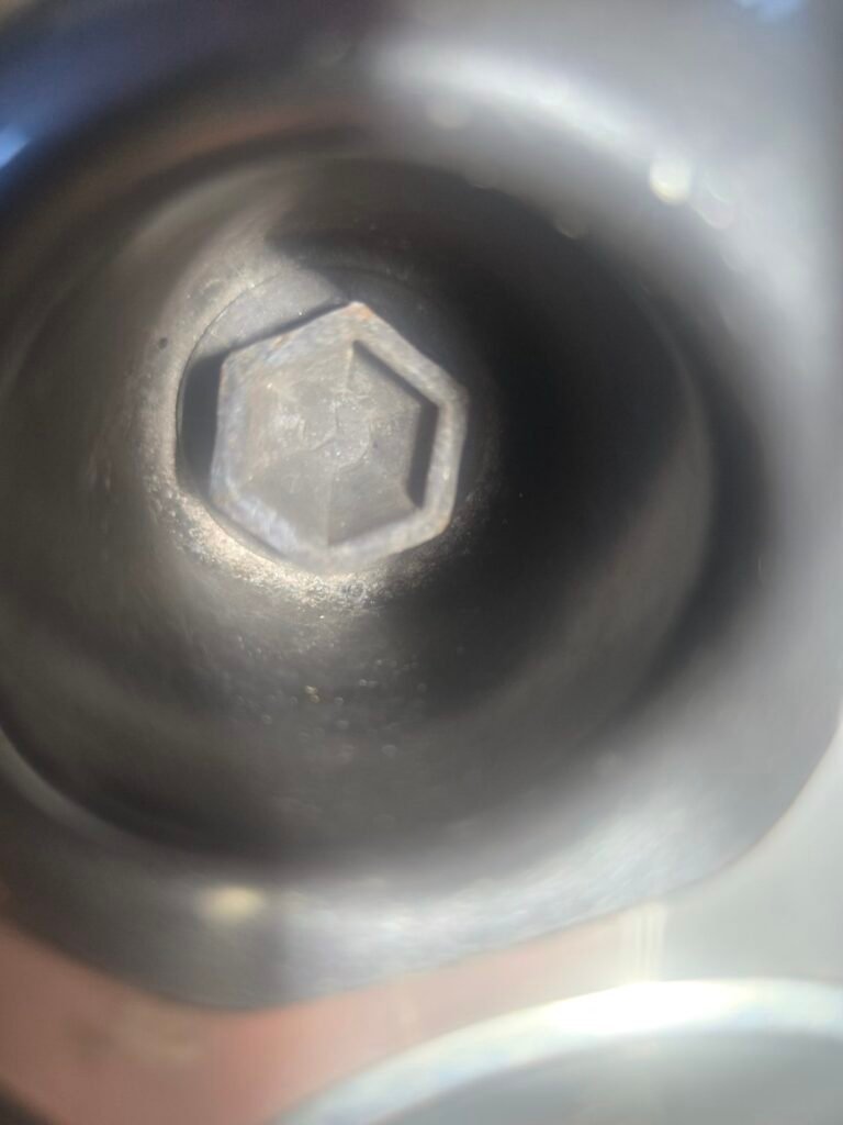 Infinity Qx30 wheel locking nut key replacement