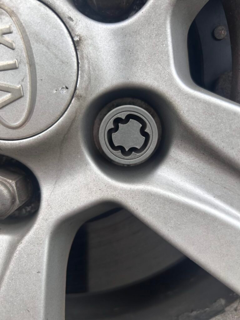 KIA Sportage wheel locking nut key replacement