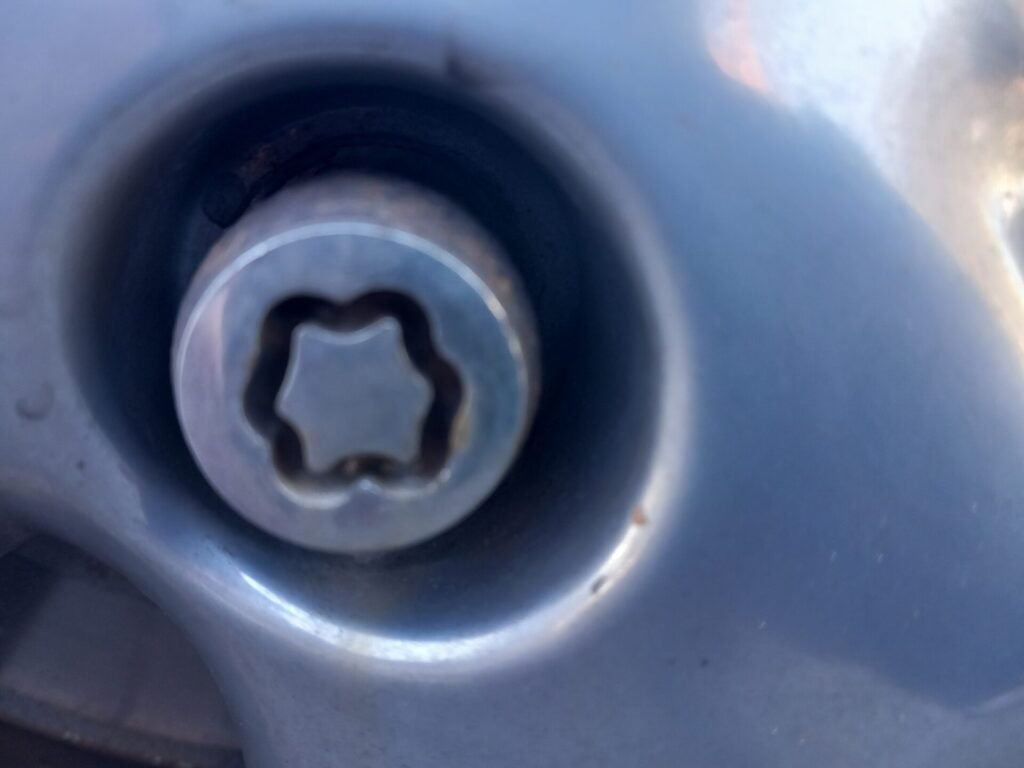 Mazda 2014 5 Sport venture wheel locking nut key replacement