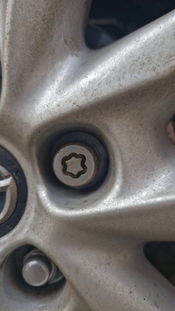 Mazda 3 sport Nav wheel locking key