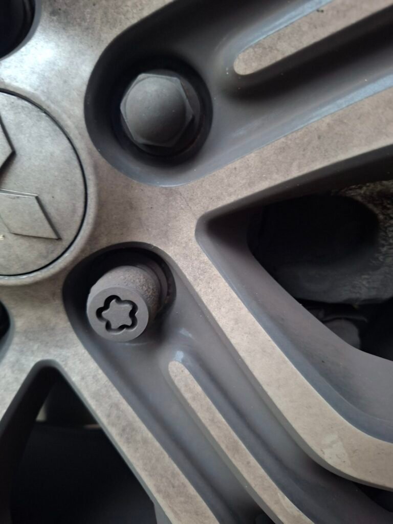 Mitsubishi i wheel locking nut key replacement