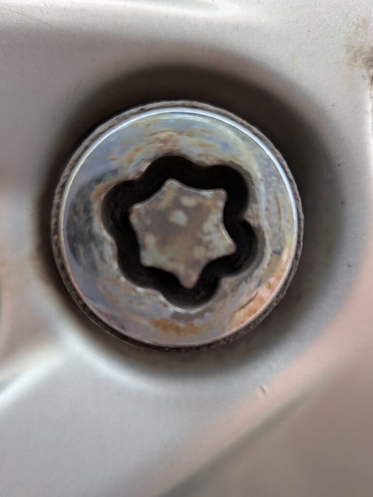 Mitsubishi Mirage 3 wheel locking nut key replacement