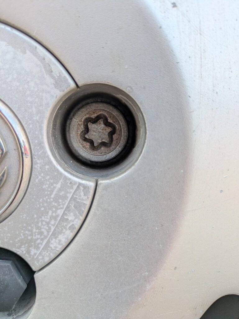 Vauxhall Corsa model c active 2003 wheel locking nut key replacement