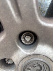 vauxhall vectra wheel lock key code