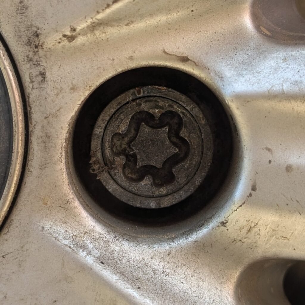 Volkswagen Touran (2016) wheel locking nut key replacement